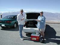 12-Mom_and_Dad_having_a_picnic_at_the_car