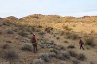 03-group_hiking_through_desert_terrain