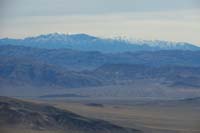 26-scenic_view_from_peak-looking_ENE-zoom_view_of_snowy_Spring_Mountains_50_miles_away