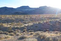 07-up_and_down_a_few_washes_as_we_cross_the_open_desert-heading_to_left_side_of_volcanic_mound