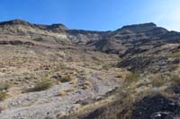 47-looking_back_from_volcanic_mound_area_to_bypass-better_light_shows_peak_summit_in_distance