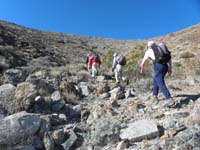 11-done_scrambling_up_that_canyon-now_up_to_ridge-Ed,Richard,Luba,Bill