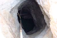 82-looking_down_into_the_well_through_the_grate