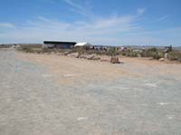 07-people_in_line_for_bus_to_Guano_Point-limited_shade