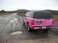 100-my_Pink_Suburban_at_beginning_of_dirt-waiting_for_Jean_and_Dave-can't_get_satellite_signal-1601pm