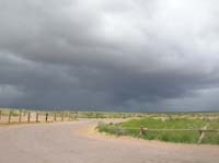 02-strong_storm_approaching-from_Hualapai_Ranch_looking_WNW_towards_welcome_center_area-1153_am