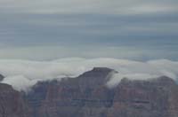 34-zoomed_view_of_clouds_rolling_over_canyon