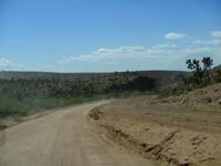 04-road_construction-need_to_limit_road_closure_during_construction_so_build_along_side_existing_dirt_road