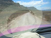 06-long_stretch_of_fresh_gravel-travel_15_mph_is_safe-note_the_other_path_others_have_taken_to_avoid_gravel