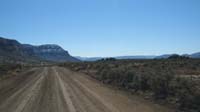 01-dirt_road_approaching_National_Park_portion-southern_side_of_Grand_Canyon_in_distance-from_Jenn