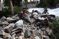 25-Carl_and_Jeff_sitting_on_Prometheus_Stump_and_fells_branches_nearby