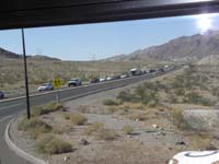 04-Hwy_93_traffic_from_Boulder_City-minor-buses_were_given_priority_by_police_to_cross