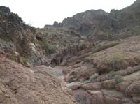08-hiking_through_a_small_canyon_in_the_wash