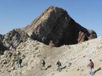 15-group_follows_a_sheep_trail_to_the_base_of_the_peak-Bethany_Scott_Eric_Ali_Susan_Colin