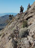 24-I'm_climbin_up_the_steep_limestone_cliff-rock_provided_great_grip-although_sharp-from_Eric