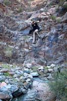 55-me_climbing_down_dry_waterfall-from_Kay