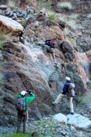 56-me_climbing_down_another_dry_waterfall-from_Kay