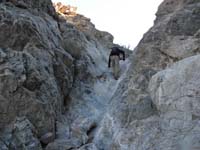 04-Peppe_climbing_up_dry_waterfall_at_beginning_of_hike