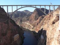 01-Hoover_Dam_and_bypass_bridge_from_Dam-20121031-peak_to_climb_in_distance_below_bridge