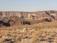 02-Black_Canyon_Overlook_and_Liberty_Bell_Arch_Peaks-arch_just_past_hill_to_right_foreground