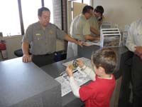 54-Kenny_gets_his_Junior_Ranger_badge_and_patch_number_29-Lake_Mead_NRA