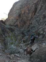 05-Mark_and_Greg_scrambling_out_of_canyon