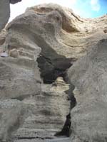 20-explore_that_tight_slot_canyon-left_packs_at_entrance