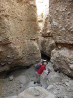 65-Kenny_really_likes_to_scramble_rocks_in_the_slot_canyon