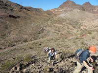 14-looking_back_to_group-off_the_trail_starting_ridge_ascent_to_peak