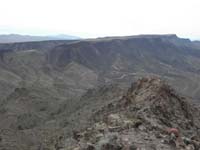 16-scenic_view_from_Kenny_Peak-dirt_road_and_future_route_to_consider_up_Malpais_Flattop_Mesa