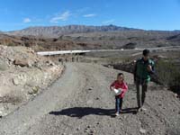 10-looking_back-Mark_and_granddaughter-she_found_a_cowboy_hat_on_side_of_road