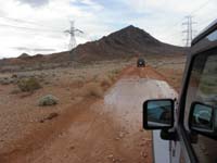 02-okay-a_little_more_than_a_puddle_on_the_dirt_road-unfortunately_the_vehicles_got_dirty