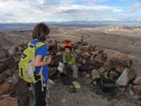 14-Sierra_and_Kenny_on_peak_at_wind_break-Kenny_found_the_registry