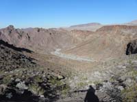 61-view_from_saddle-heading_down_to_that_drainge_and_then_to_right_for_2.5_miles_back_to_vehicle