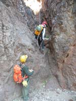 23-Bill_rappelling_down-Ed_in_place_as_a_fireman's_belay