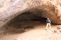 07-Andy_checking_out_cave_near_river