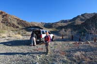 02-Luba_and_Ed_at_trailhead-going_up_prominent_ridgeline_to_right