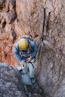 07-Ed_setting_up_first_rappel_after_10_min_entering_canyon-someone_installed_two_bolts