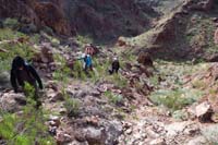 06-group_scrambling_up_steep_grade-John_helping_his_wife_who_is_taking_it_slow