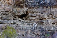 07-me_next_to_igneous_wall_formation_with_interesting_layers_and_a_small_cave-from_John