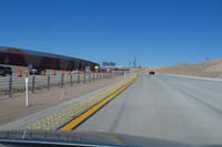 67-admiring_the_new_I11_construction-area_for_Railroad_Pass-nice_Hoover_Dam_artwork_to_left