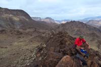 17-Laszlo_on_that_little_peak_having_a_snack-looking_back_to_where_we_traveled_from