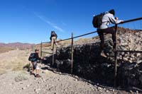 02-climbing_over_fence,Glenn_thinks_he'll_catch_John,what_about_Emily