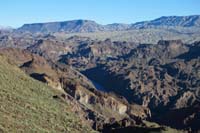 07-very_scenic_view_looking_up_stream_with_Fortification_Hill_in_distance-Bighorn_Canyon_below
