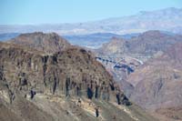 66-scenic_view_from_top_of_ramp-zoom_of_Lizardback,Head,Horn_Peaks_and_Hoover_Dam_bypass_bridge