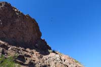 52-traversing_terrain_with_military_helicopters_flying_overhead