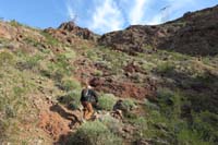 03-Brett_heading_up_a_slope_existing_the_canyon-heading_to_ridgeline_notch_above