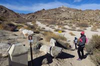 03-family_at_trailhead-petroglyphs_are_at_canyon_to_upper_left-very_easy_walk