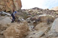 32-scrambling_up_the_rocks_to_the_petroglyph_panel