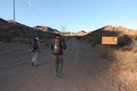 01-Patti_and_Brett_walking_up_Goldstrike_Parallel_Rd_from_Goldstrike_Cyn_parking_lot